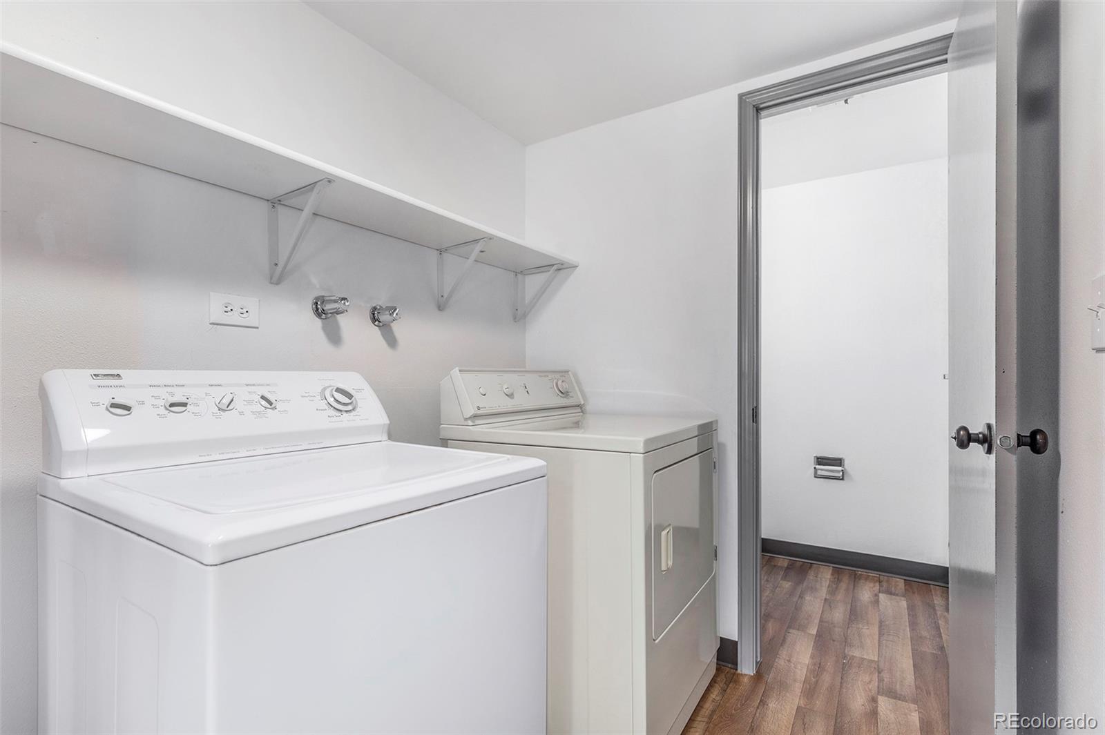 3792 South Fenton Way Denver, CO 80235 - Photo 18 of 19 a utility room with dryer and washer