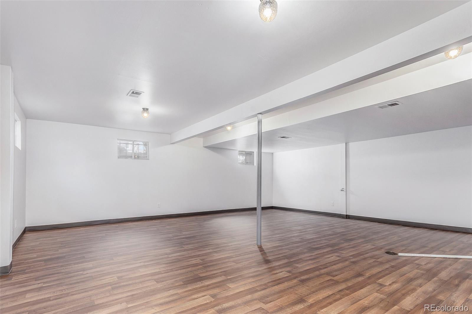 3792 South Fenton Way Denver, CO 80235 - Photo 19 of 19 wooden floor in an empty room