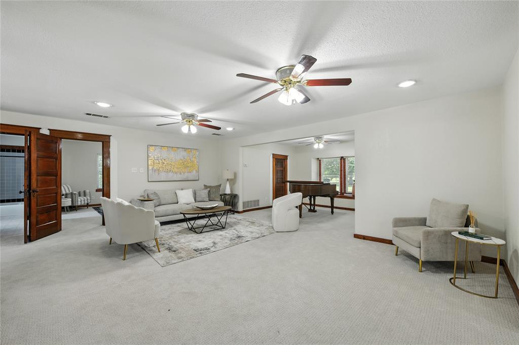 1323 Dublin Street Grapevine, TX 76051 - Photo 11 of 40 a living room with furniture and a chandelier