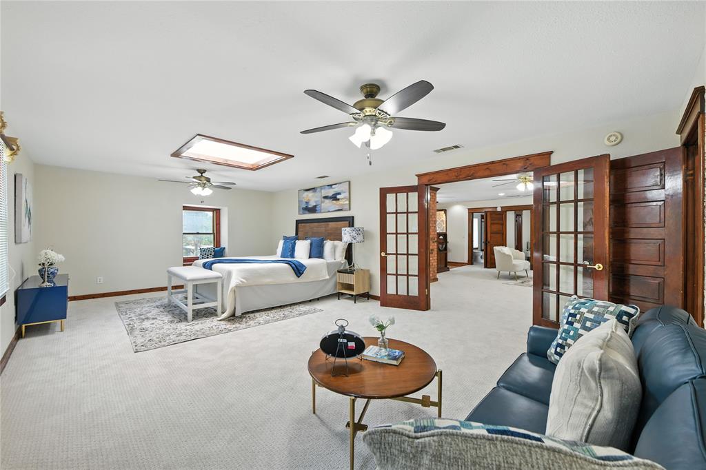 1323 Dublin Street Grapevine, TX 76051 - Photo 15 of 40 a living room with furniture and a chandelier