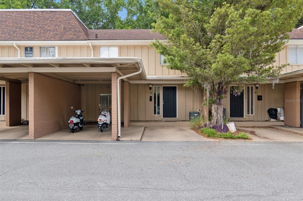 507 Northwest 39th Road, Unit 154 Gainesville, FL 32607 - Photo 1 of 1 a view of a house with outdoor space and porch