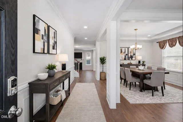 a view of front door of house with stairs