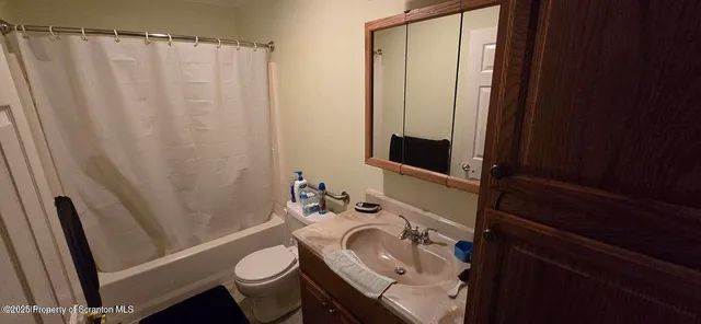 a view of a dining room with furniture and toys