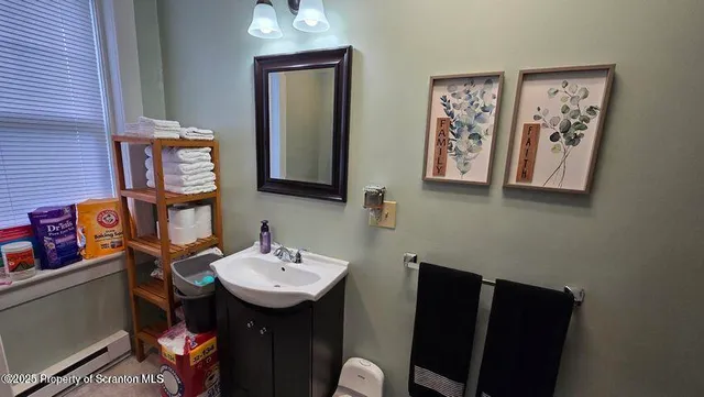 a bathroom with a tub and a shower