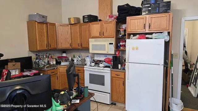 a bathroom with a shower and a toilet