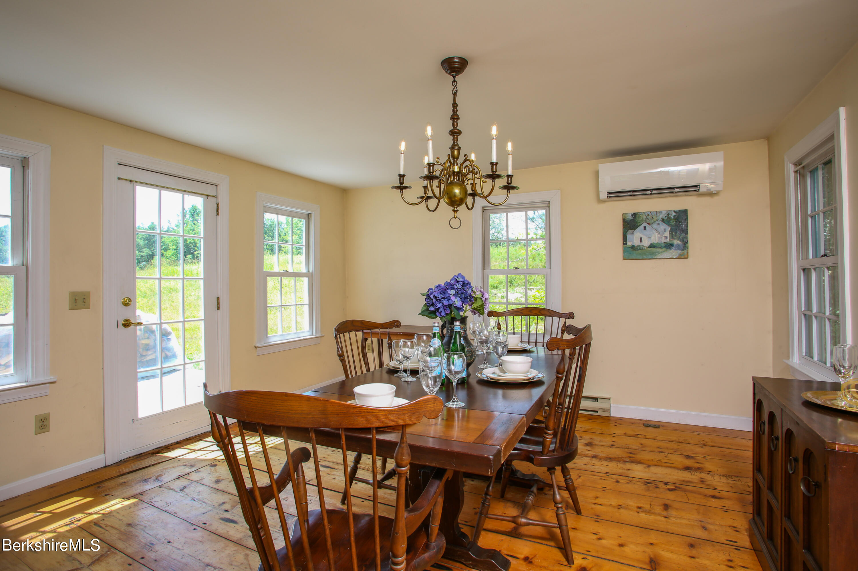 1256 East Windsor Road Windsor, MA 01270 - Photo 10 of 34 a dining room with furniture a chandelier and wooden floor