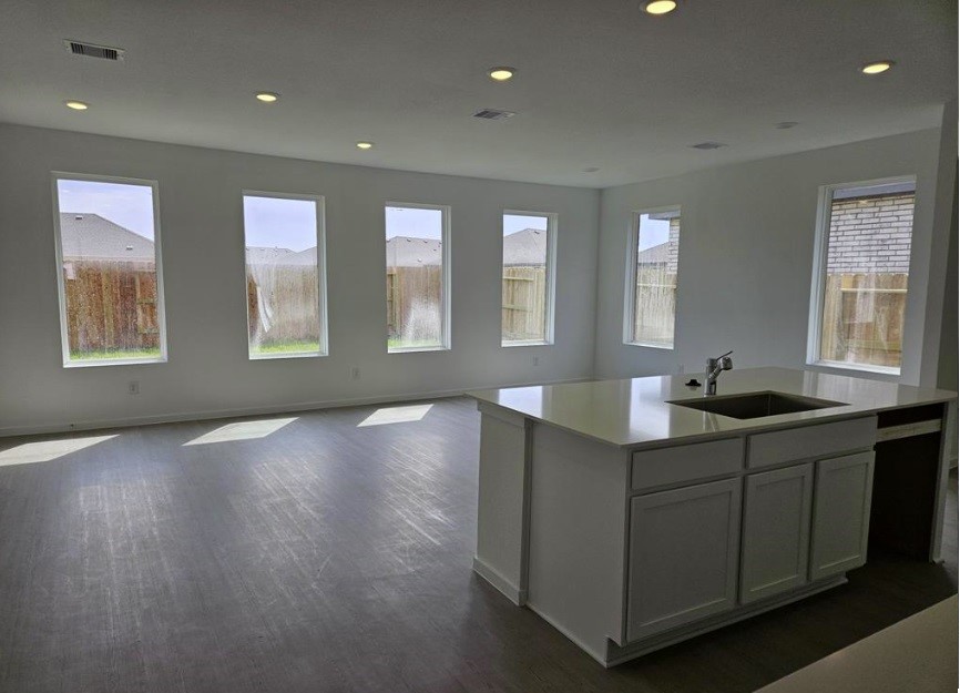 415 Robin Court Angleton, TX 77515 - Photo 4 of 9 a kitchen with sink and window