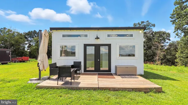 a kitchen with a sink stove and microwave