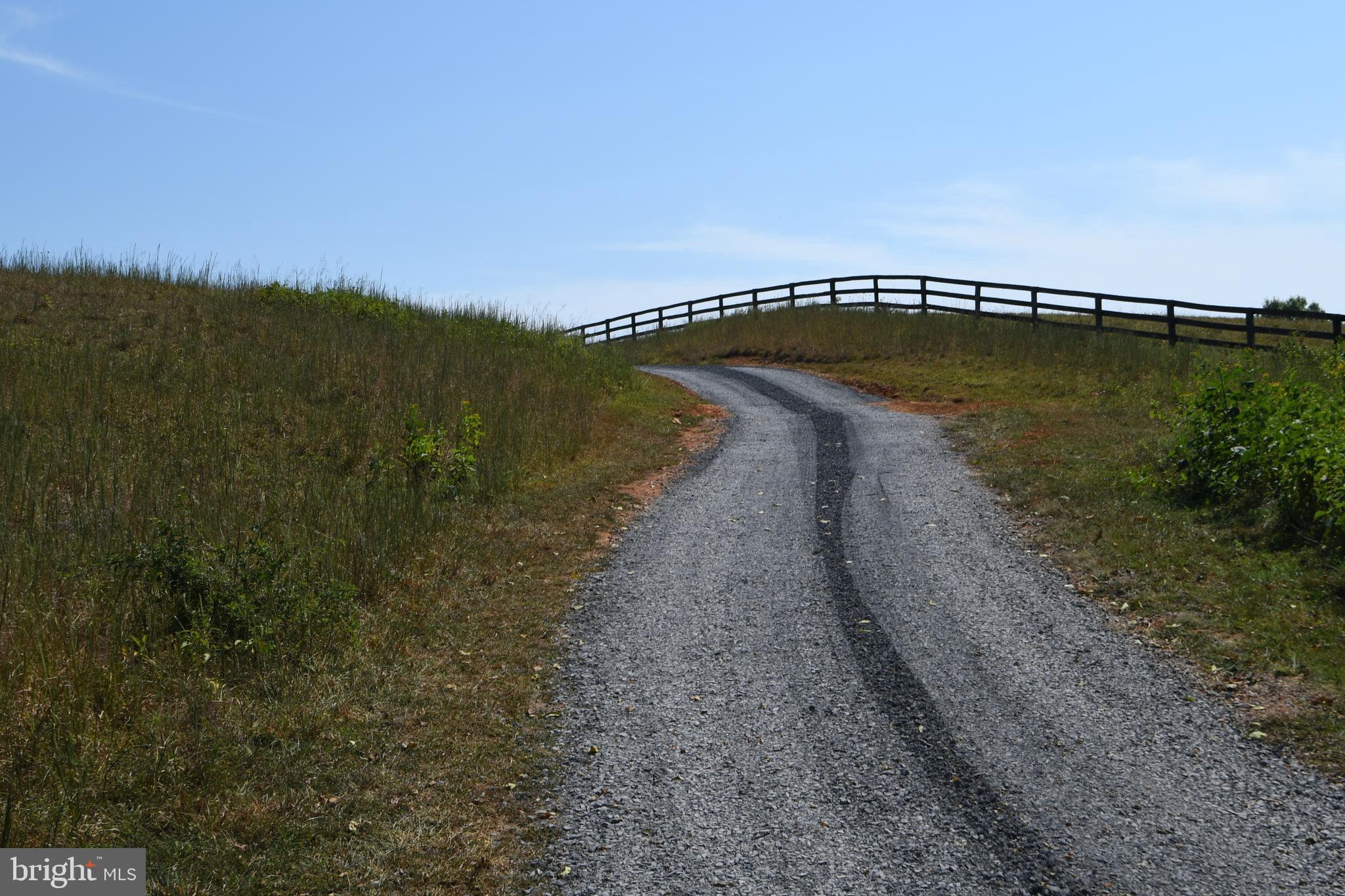 2919 Rokeby Road Delaplane, VA 20144 - Photo 39 of 40 a view of a lake with a mountain in the background