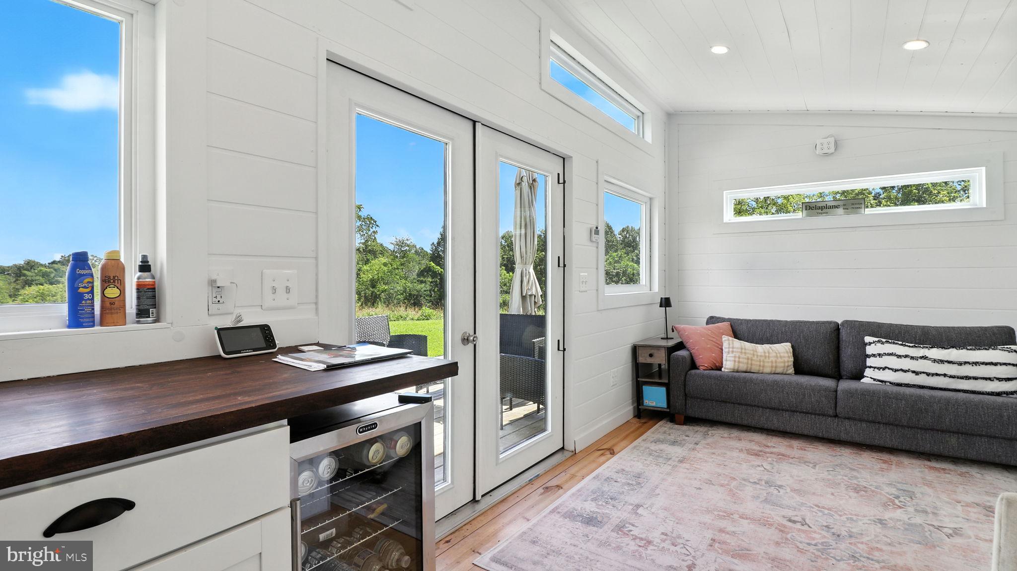 2919 Rokeby Road Delaplane, VA 20144 - Photo 4 of 40 a living room with furniture and a window