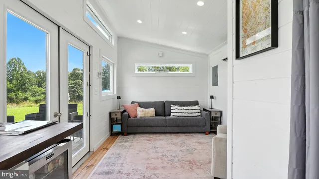 a view of a field with an ocean