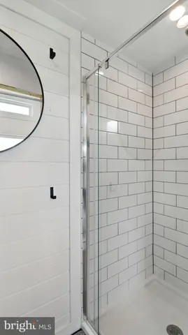 a view of a big yard with an outdoor seating