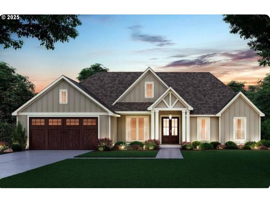 a front view of a house with a garden