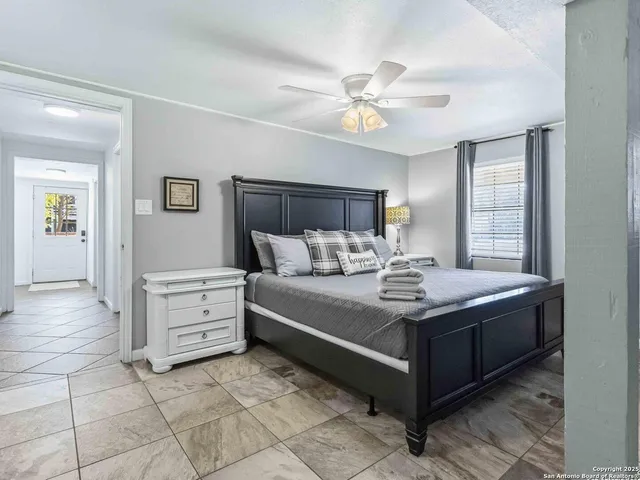 a view of living room with furniture and window
