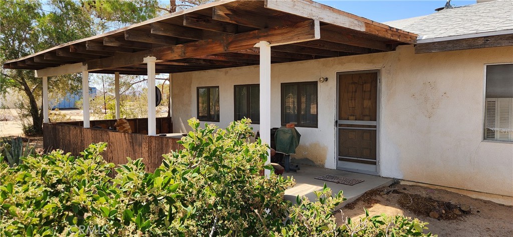 a view of a house with patio