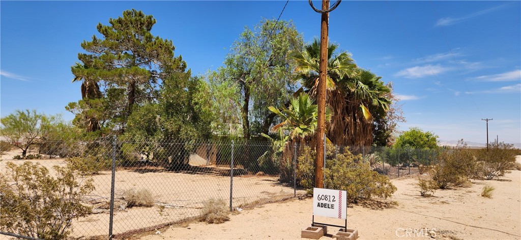 60812 Adele Road Landers, CA 92285 - Photo 2 of 19 a street view covered with snow