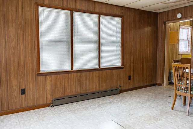 an empty room with windows