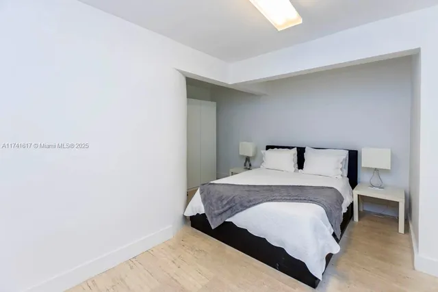 a view of a house with pool and chairs