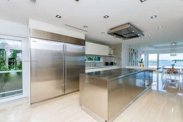 a view of an house with swimming pool and porch