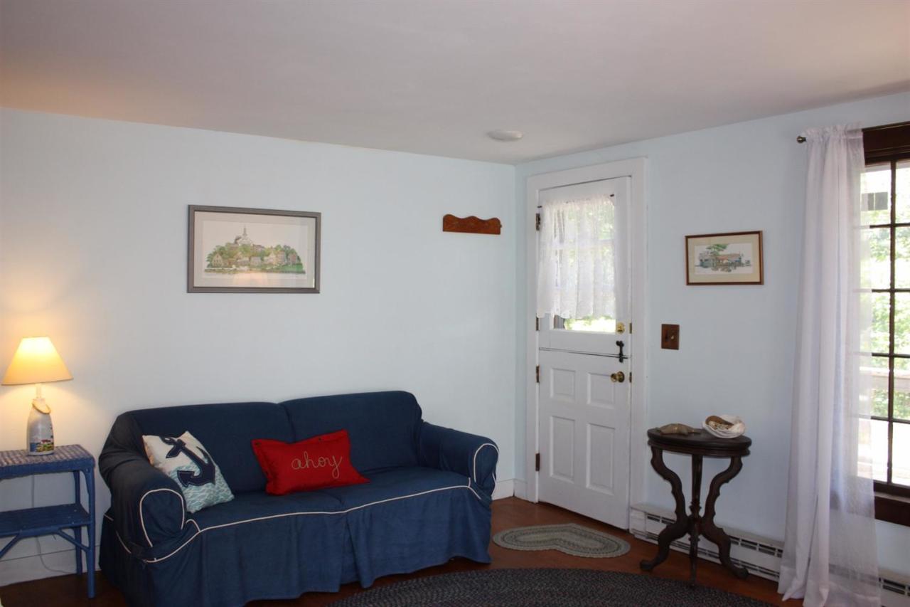 106 Cottontail Road, Unit A7 Wellfleet, MA 02667 - Photo 7 of 13 a living room with furniture and a window