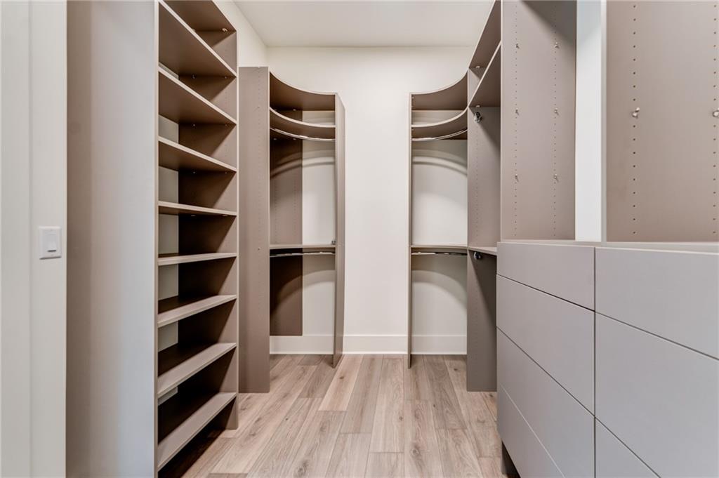 1 Cason Drive Canton, GA 30114 - Photo 21 of 28 a view of walk in closet with empty racks