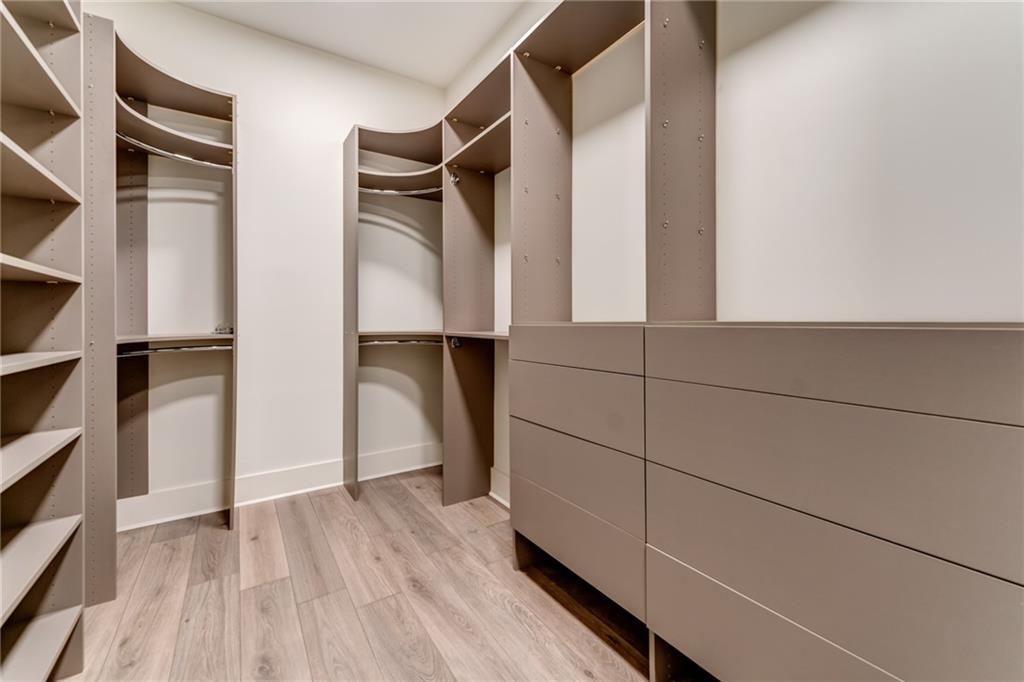 1 Cason Drive Canton, GA 30114 - Photo 22 of 28 a view of walk in closet with empty racks