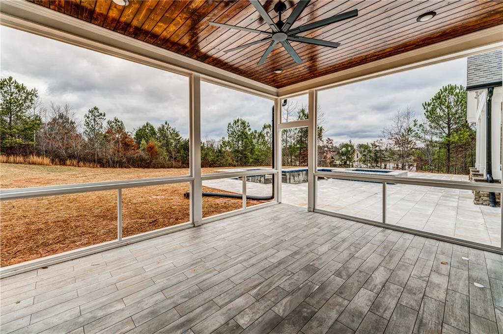 1 Cason Drive Canton, GA 30114 - Photo 23 of 28 a view of an empty room with wooden floor and fence