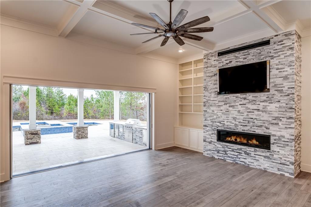 1 Cason Drive Canton, GA 30114 - Photo 24 of 28 a living room with fireplace furniture and a flat screen tv