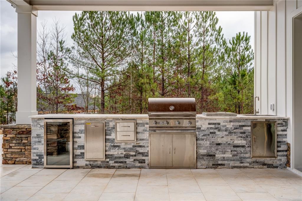 1 Cason Drive Canton, GA 30114 - Photo 27 of 28 a room with fireplace and window