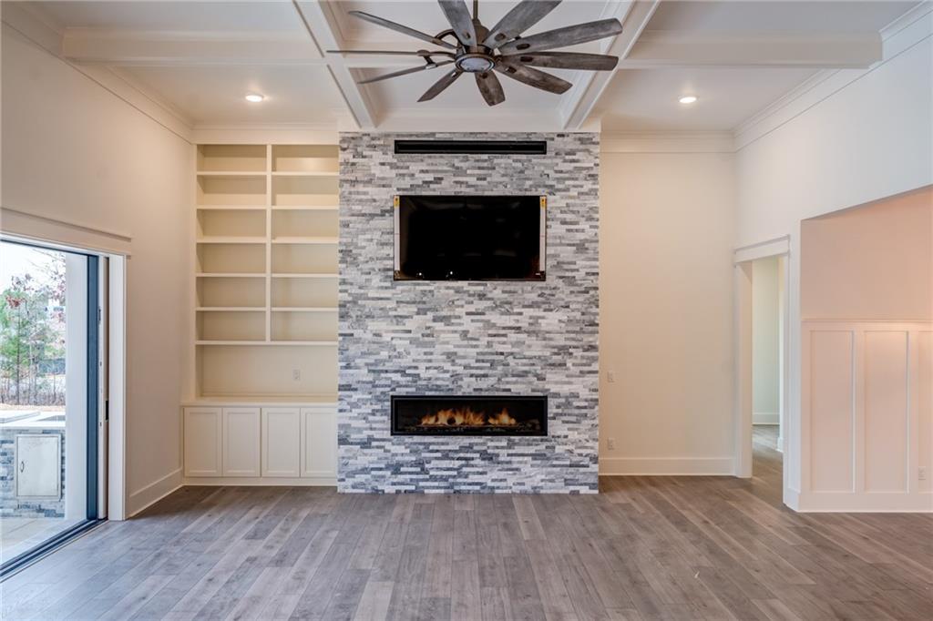1 Cason Drive Canton, GA 30114 - Photo 7 of 28 a living room with a fireplace and a fireplace