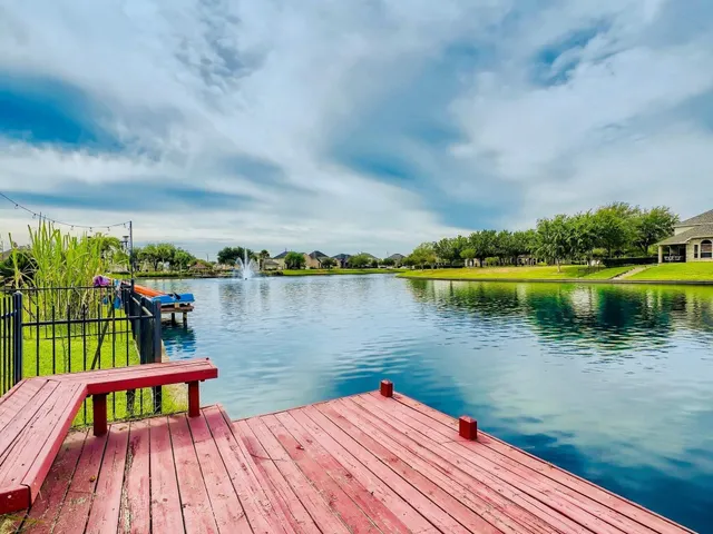 a view of a lake with deck