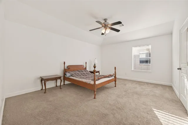 a view of a balcony with wooden floor