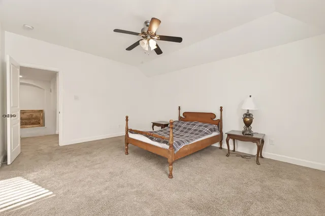 a view of a balcony with wooden floor