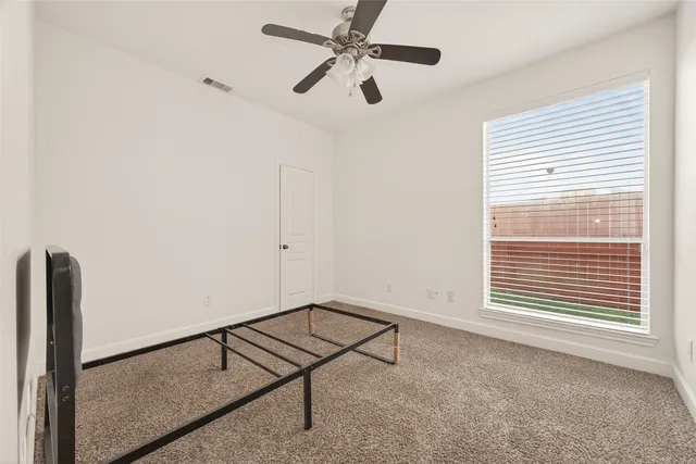 a view of a balcony with wooden floor