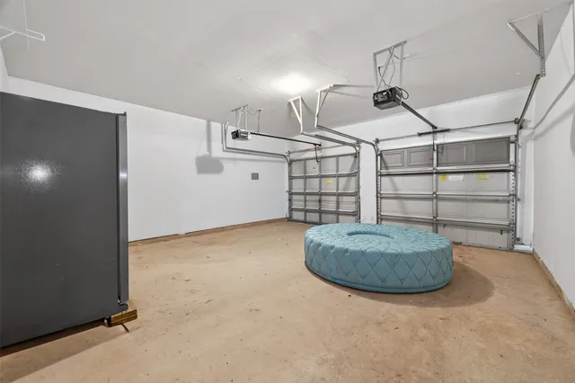 a view of a house with pool and lake view