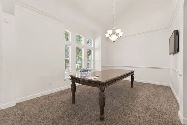 a view of a workspace with furniture