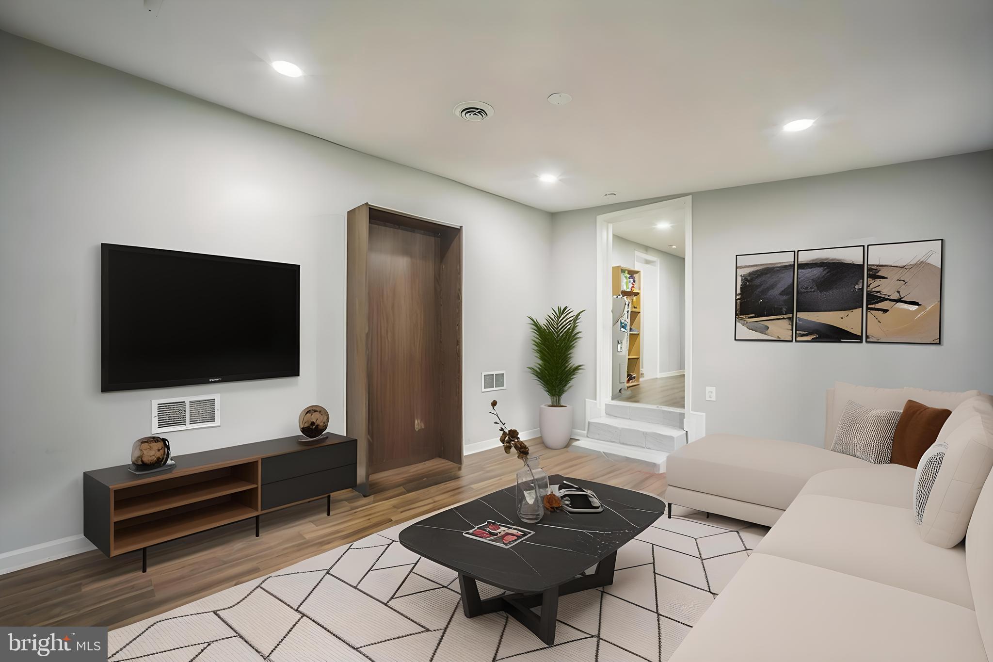4183 Grant Lane The Plains, VA 20198 - Photo 12 of 29 a living room with furniture and a flat screen tv