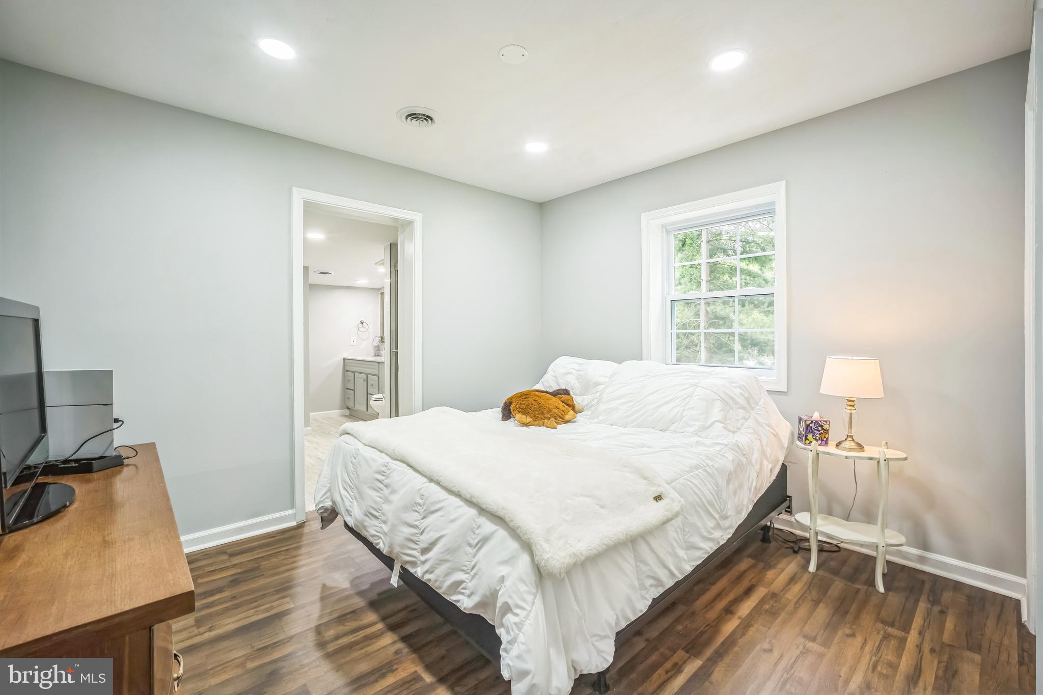 4183 Grant Lane The Plains, VA 20198 - Photo 14 of 29 a bedroom with a bed and a tv