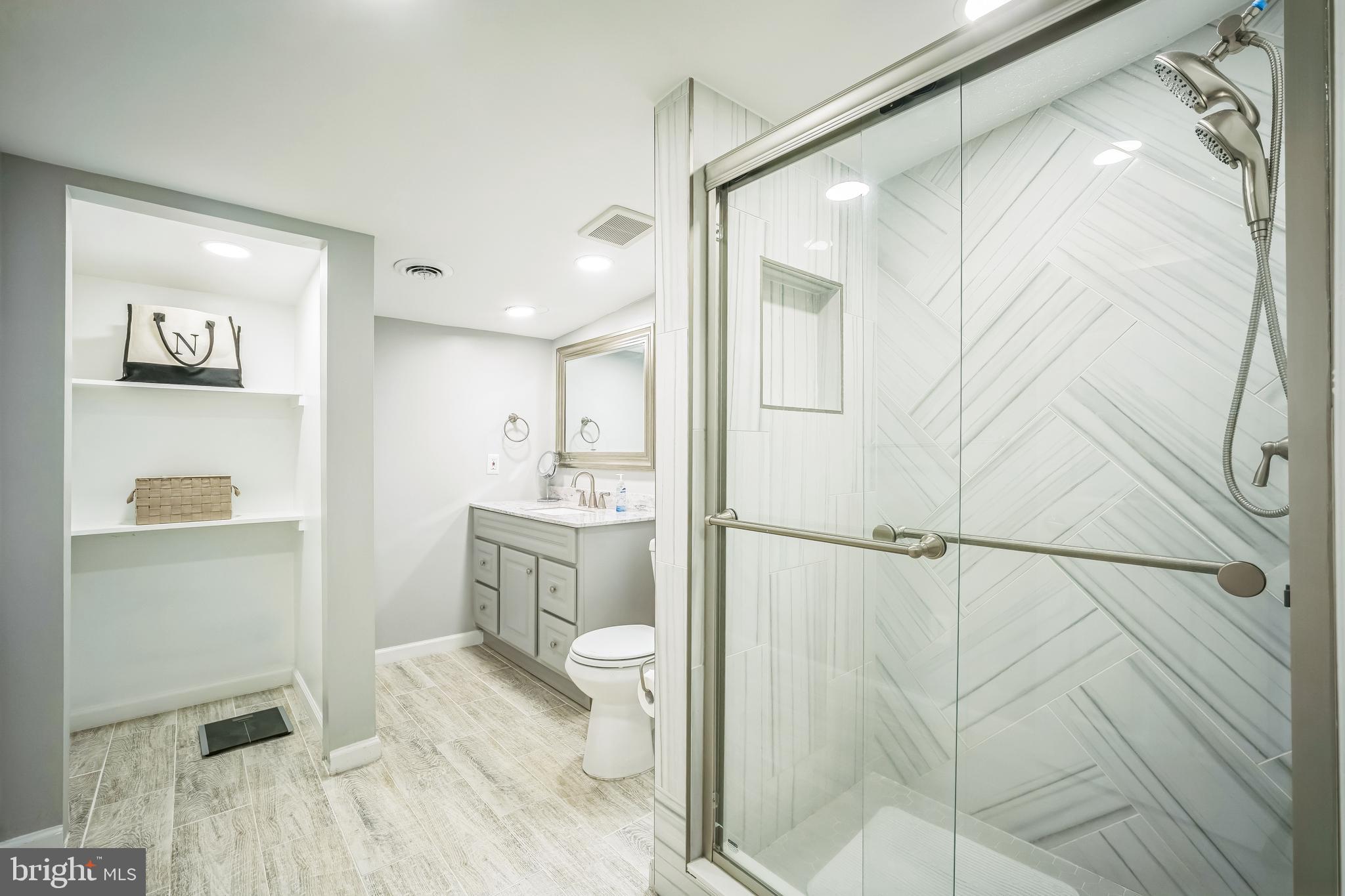 4183 Grant Lane The Plains, VA 20198 - Photo 15 of 29 a bathroom with a sink toilet and shower