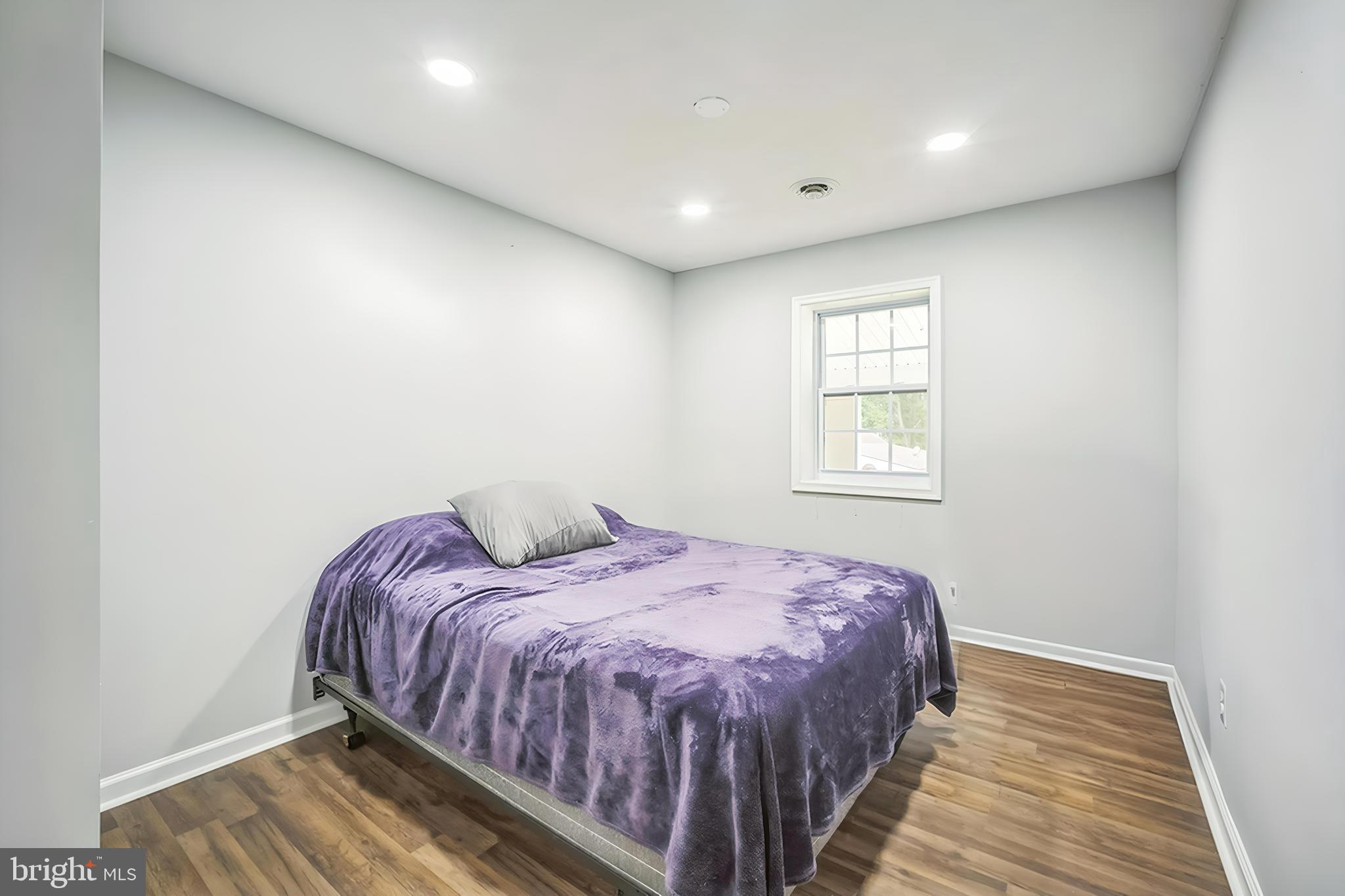 4183 Grant Lane The Plains, VA 20198 - Photo 19 of 29 a bedroom with a bed and wooden floor