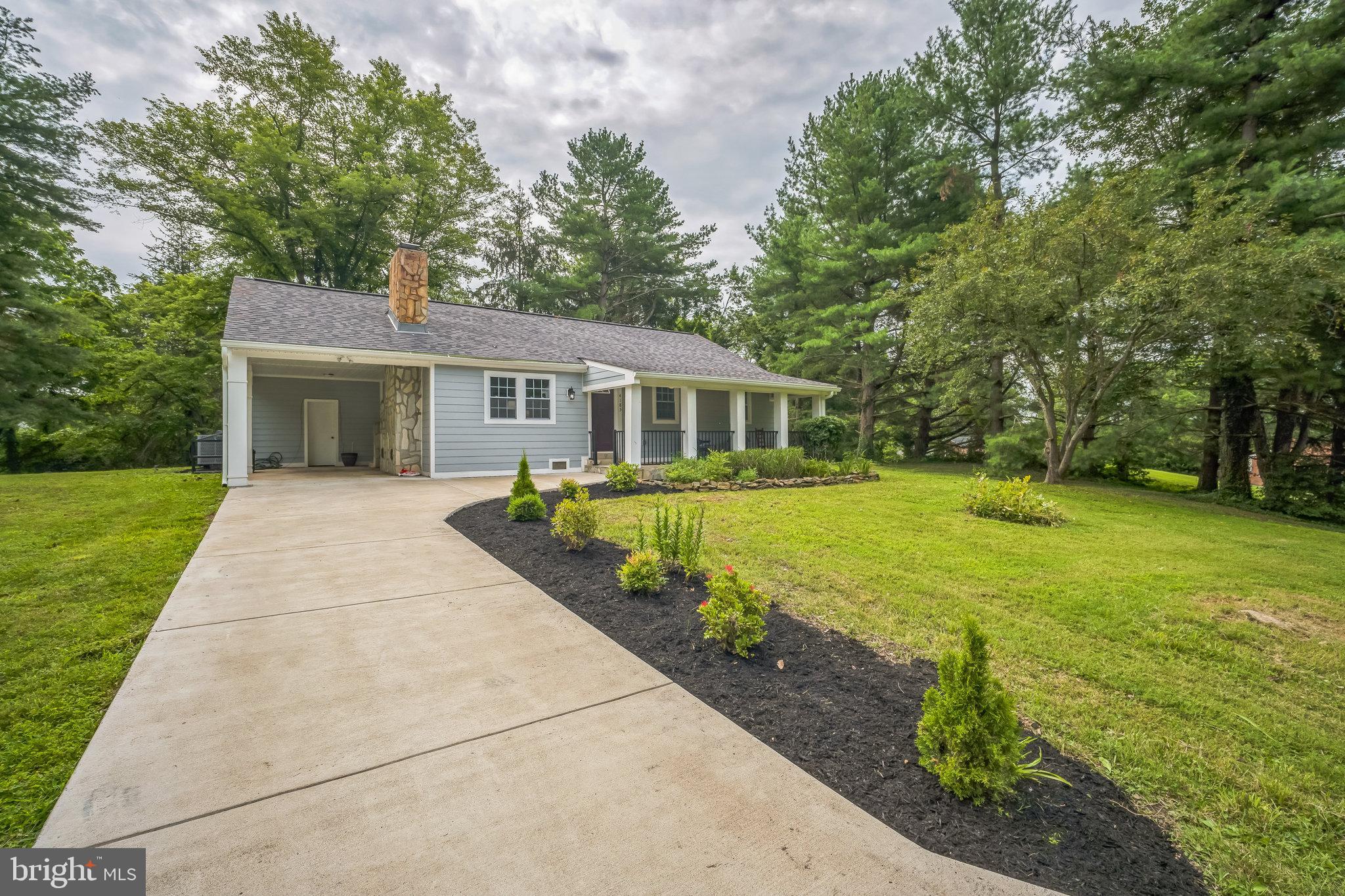 4183 Grant Lane The Plains, VA 20198 - Photo 2 of 29 a front view of house with yard and green space