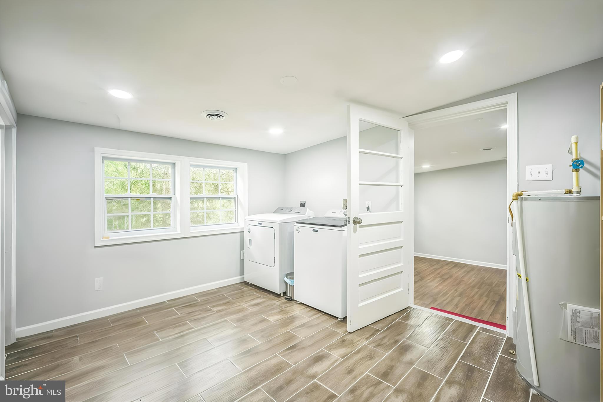4183 Grant Lane The Plains, VA 20198 - Photo 24 of 29 a view of a kitchen with white cabinets and refrigerator