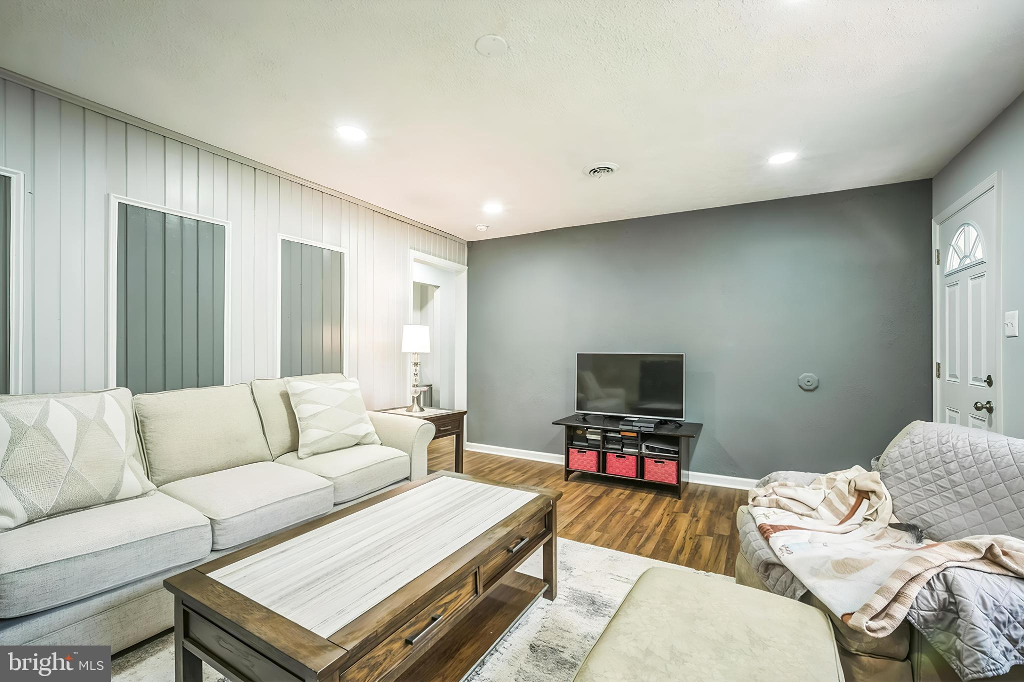 4183 Grant Lane The Plains, VA 20198 - Photo 6 of 29 a living room with furniture and a flat screen tv