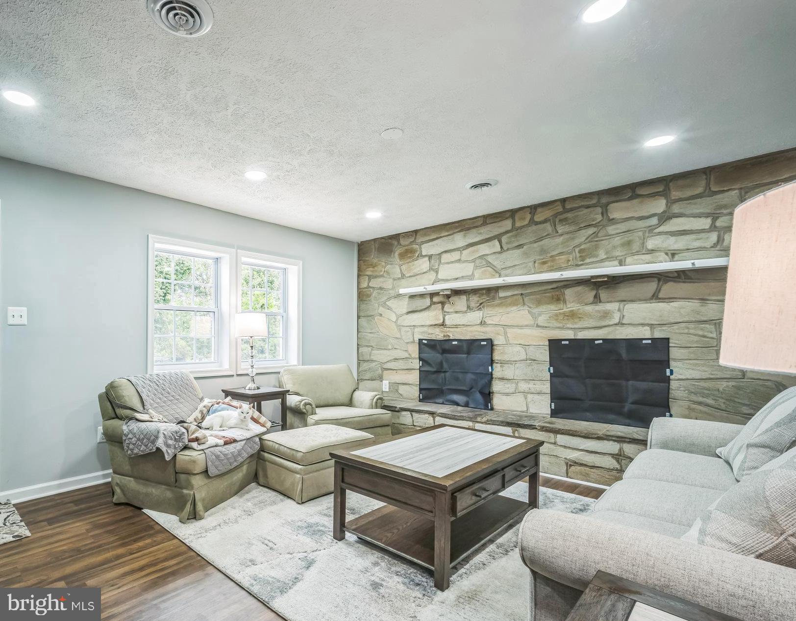 4183 Grant Lane The Plains, VA 20198 - Photo 7 of 29 a living room with furniture and a fireplace