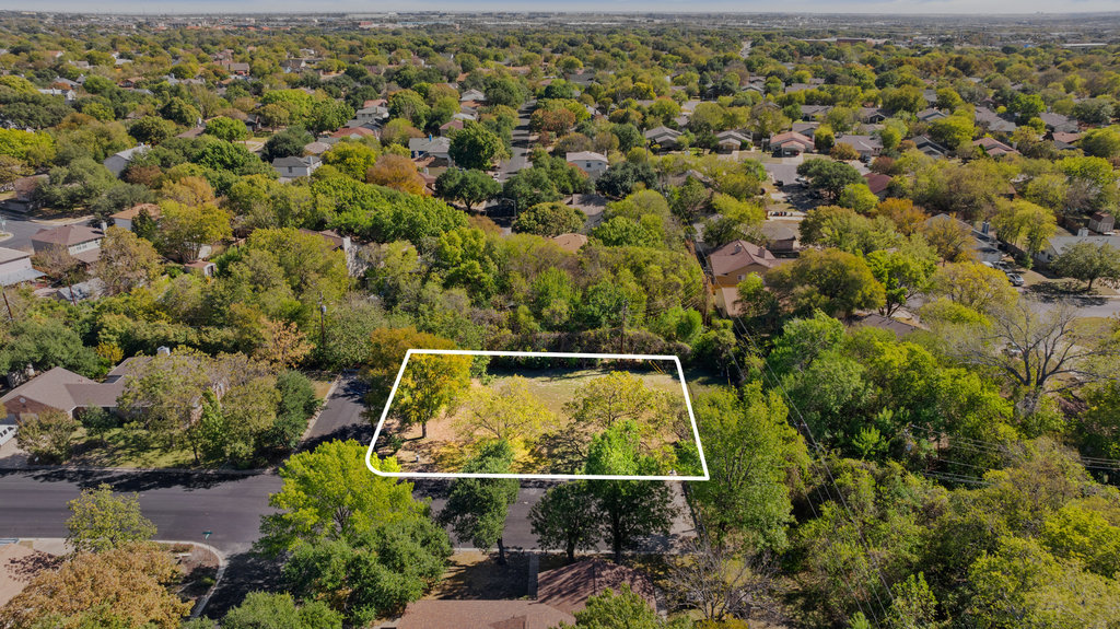 Aerial overview of property's location featuring property parcel outlined