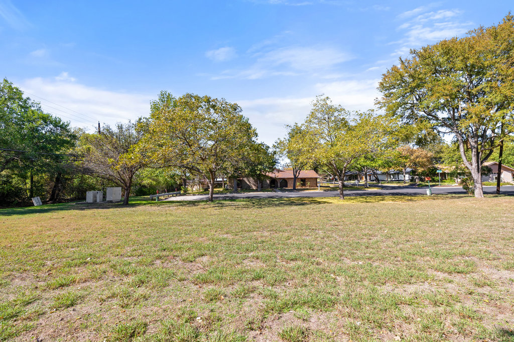 13003 Winwick Way Austin, TX 78727 - Photo 21 of 24 View of green lawn