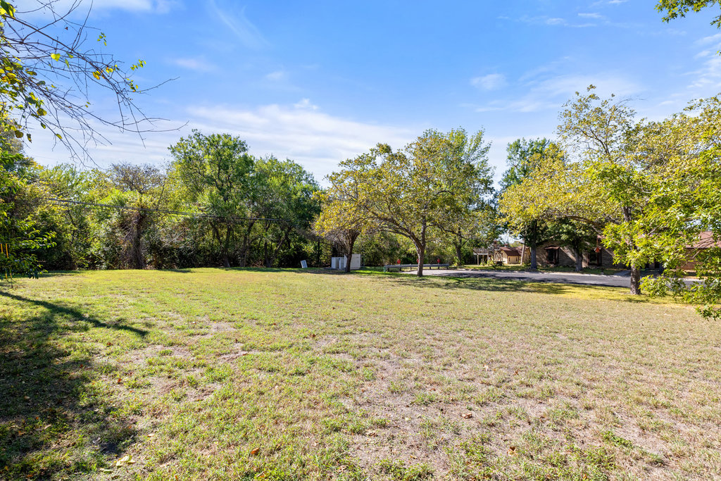 13003 Winwick Way Austin, TX 78727 - Photo 23 of 24 View of green lawn
