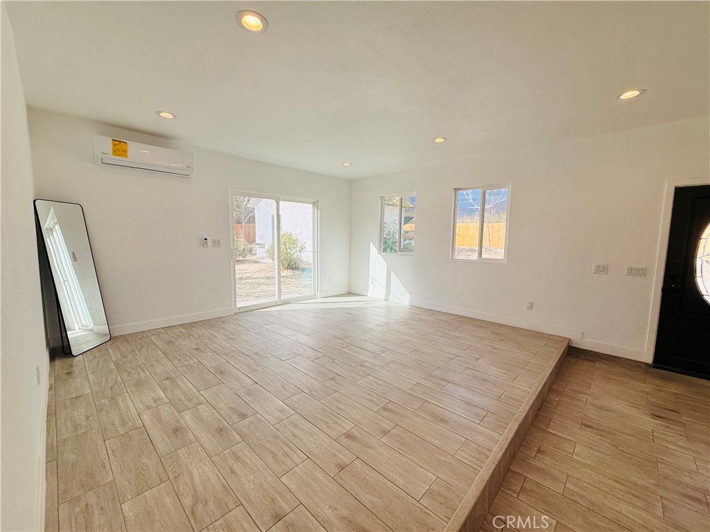 9888 Terrace Drive Morongo Valley, CA 92256 - Photo 6 of 33 Living room with sliding door exit.