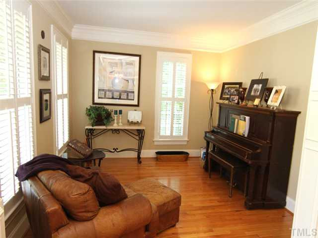 7305 Sparhawk Road Wake Forest, NC 27587 - Photo 4 of 25 THIS FIRST FLOOR STUDY/OFFICE IS PERFECT FOR THE "WORK FROM HOME" OWNER OR IT CAN BE USED AS A MUSIC ROOM, KEEPING ROOM OR FORMAL SITTING AREA. YOUR CHOICE! Studio/Study/Office