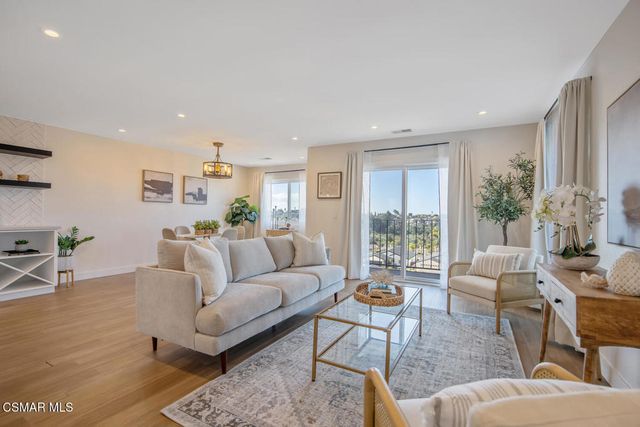 a view of a city with tall buildings